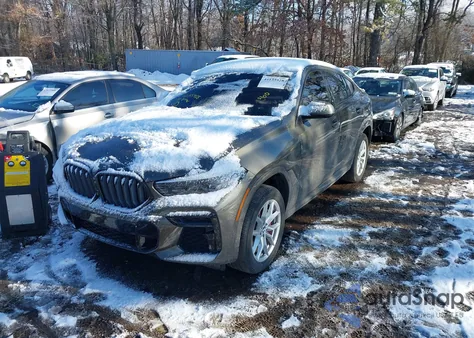 2022 BMW X6 xDrive40I z USA, uszkodzony, nr VIN 5UXCY6C01N9K82817